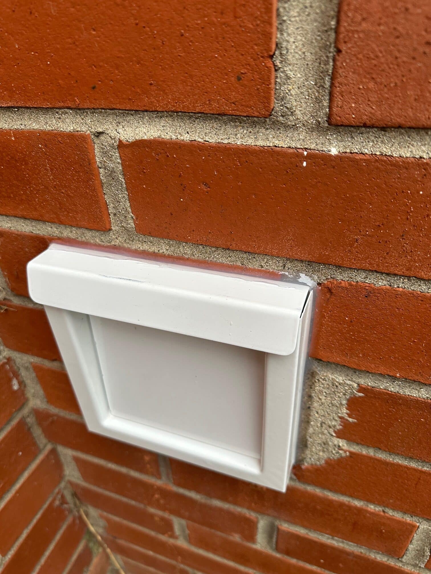 This after photo shoes a rodent-proof dryer vent cover installed at a home for rodent control in Lexington, KY.