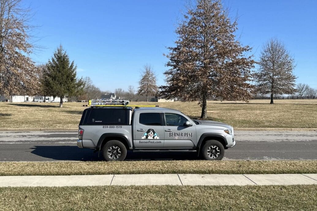 Berner Pest Solutions service vehicle parked at a Lexington, KY residential property during a rodent control service call.