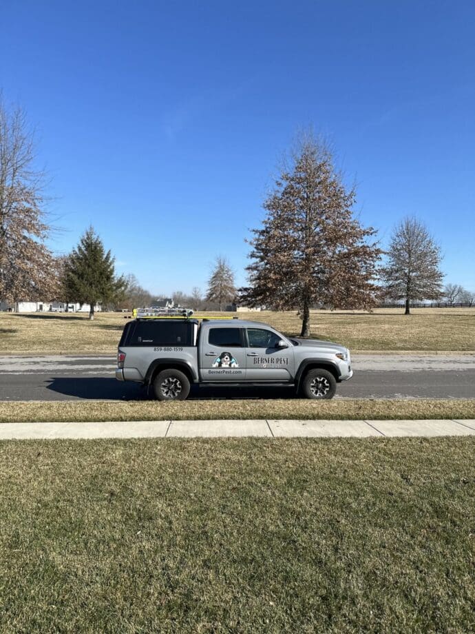 Berner Pest Solutions service vehicle parked at a Lexington, KY residential property during a rodent control service call.